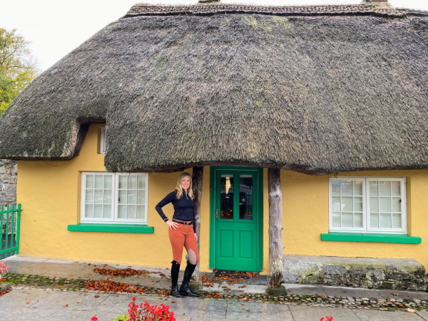 yellow thatched roof cottage in Adore