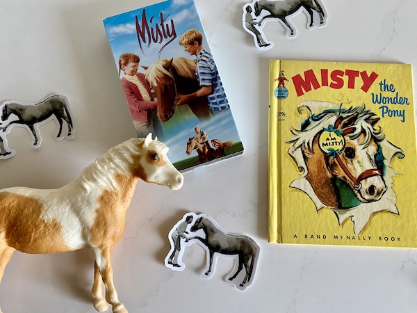 flat lay of Misty Breyer, Misty movie and Misty the Wonder Pony