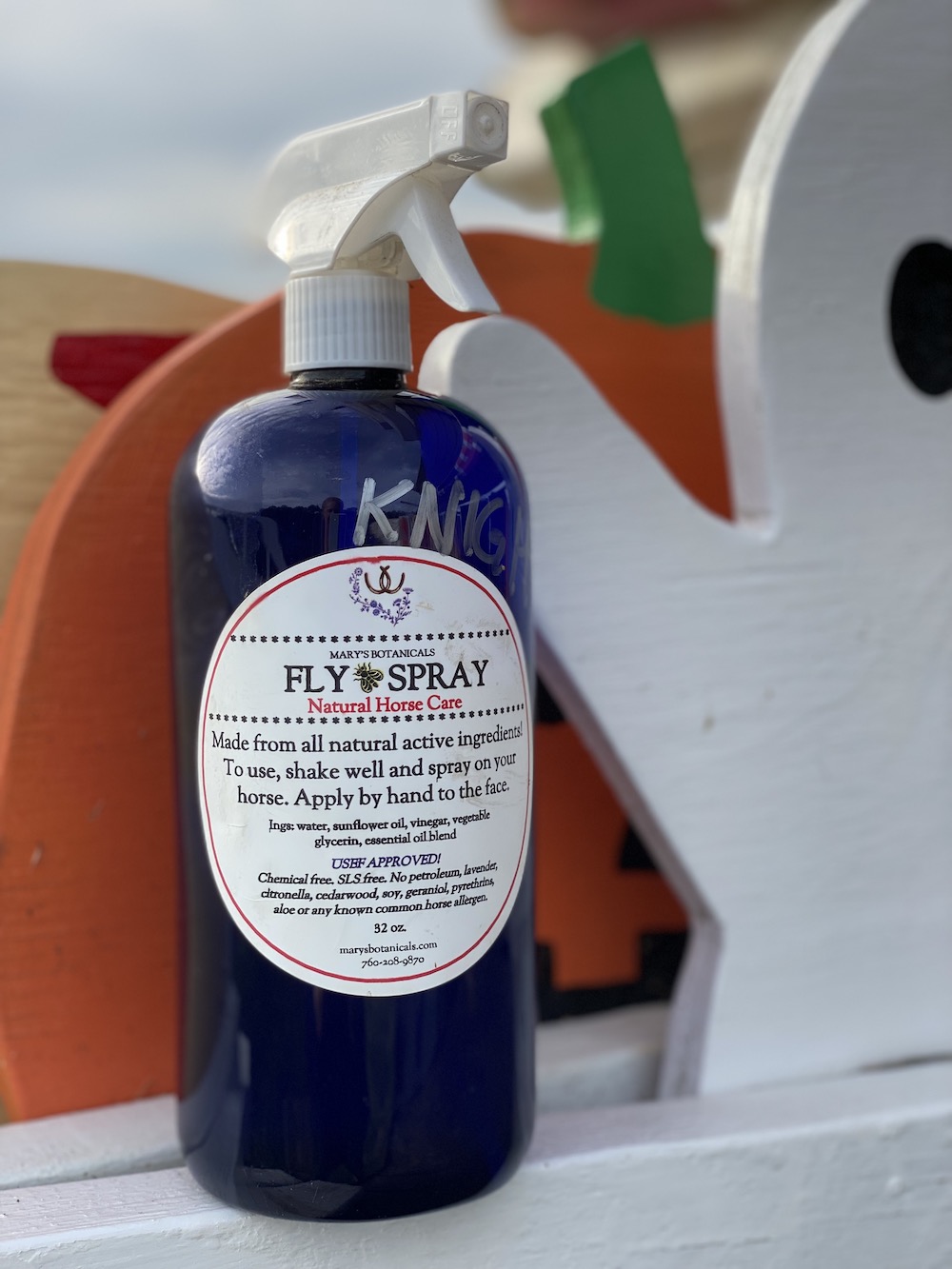 Mary's Botanicals Natural Fly Spray for Horses in a blue bottle. 